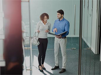 man and woman discussing rental property